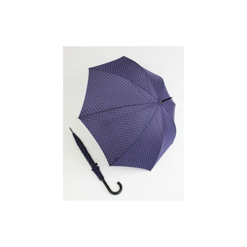 Long plain umbrella with white polka dots and cane
